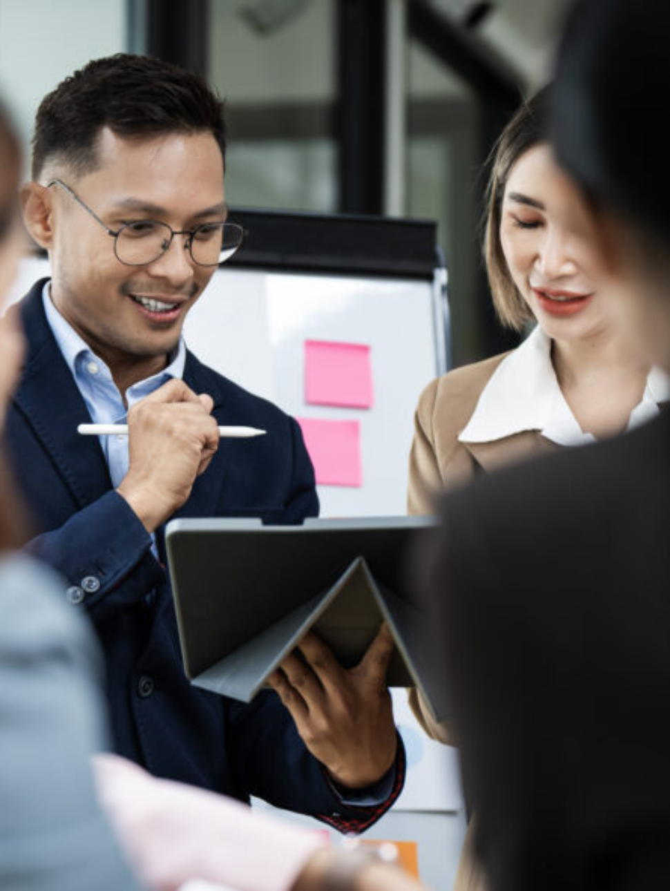 Business team in discussion during a Sage Intacct implementation planning meeting, highlighting collaboration and strategy for successful deployment.