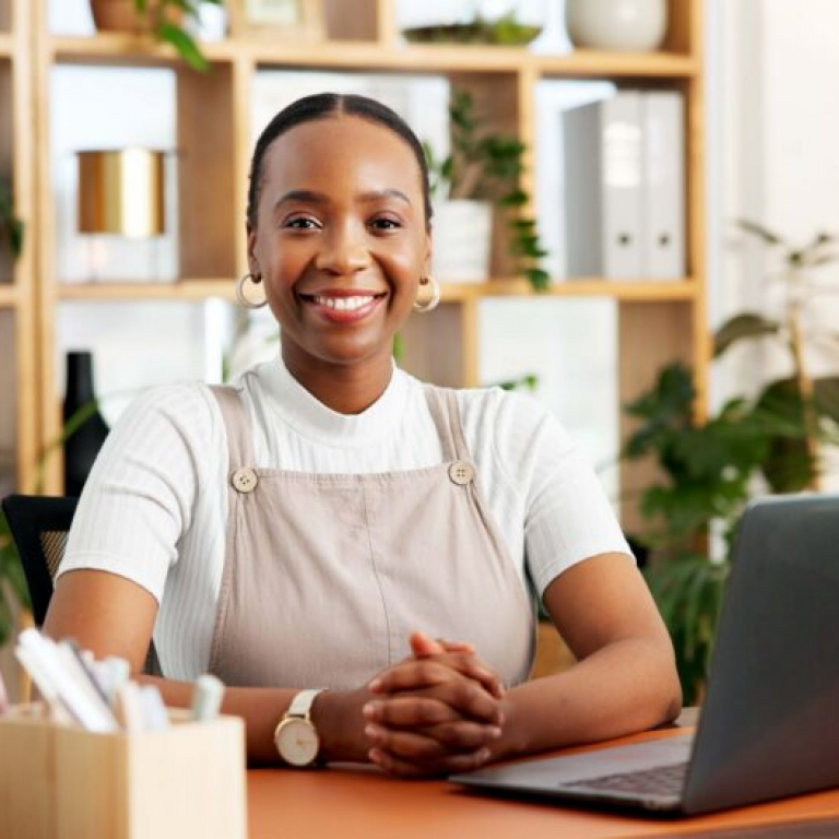 Small business owner comparing cloud accounting software options on a laptop