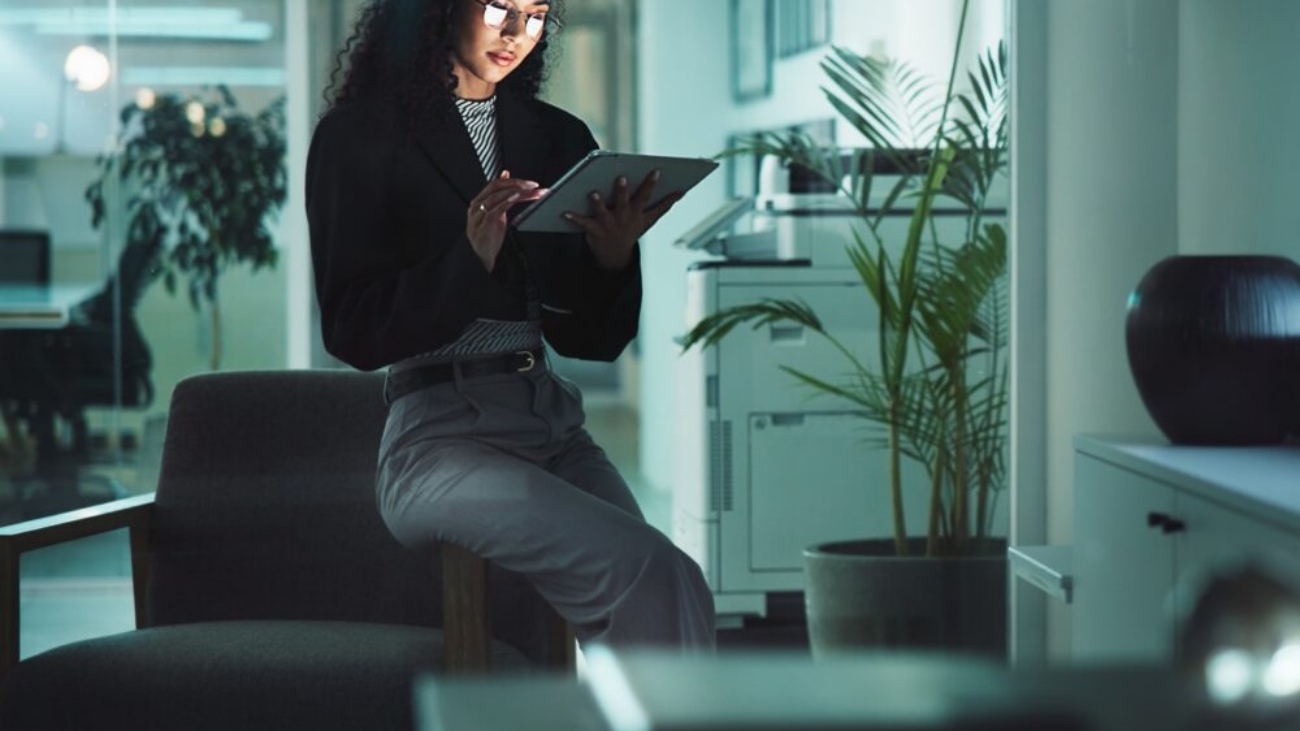 Finance professional using Sage Copilot AI assistant inside Sage Intacct
